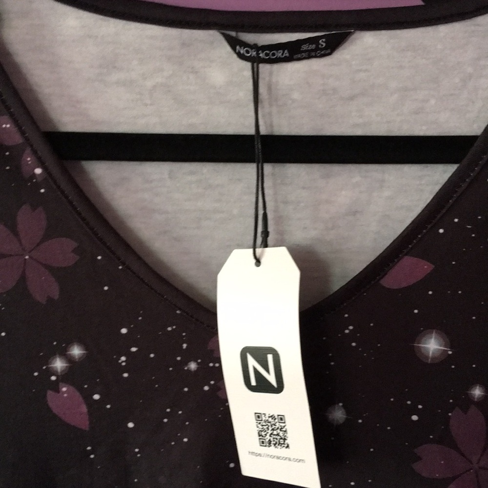 Noracora new with tags size small and never worn before, Celestial flowers new